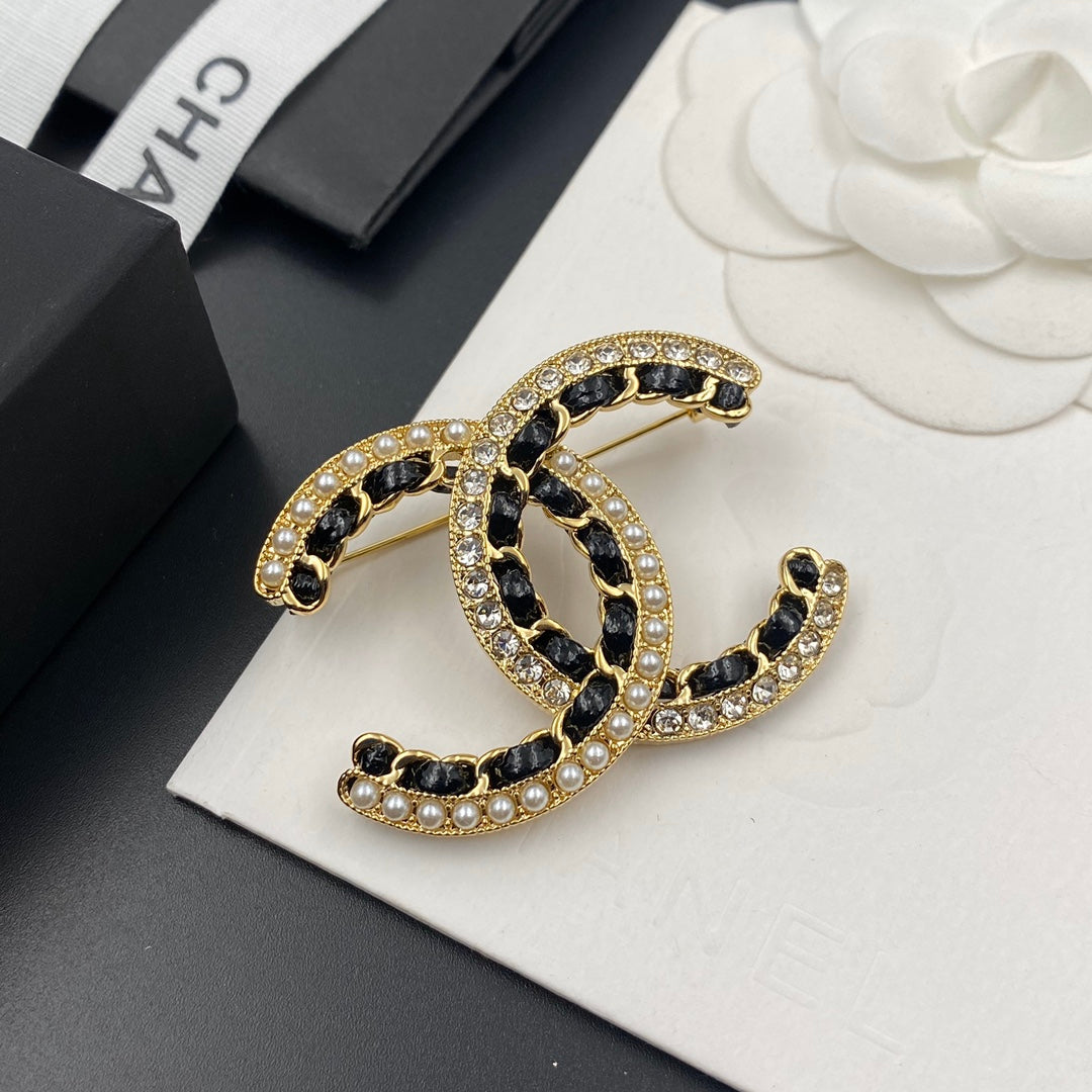 Profilbild Diamond Perlen Black Gold Brosche