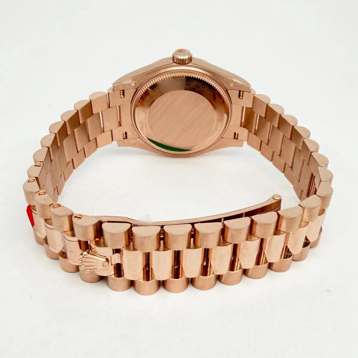 Rosé Éclat – Gehäuserückseite und geschlossenes Gliederarmband
