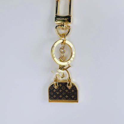 Designer-Mini-Taschenanhänger mit Metallcharms – Originalansicht 2